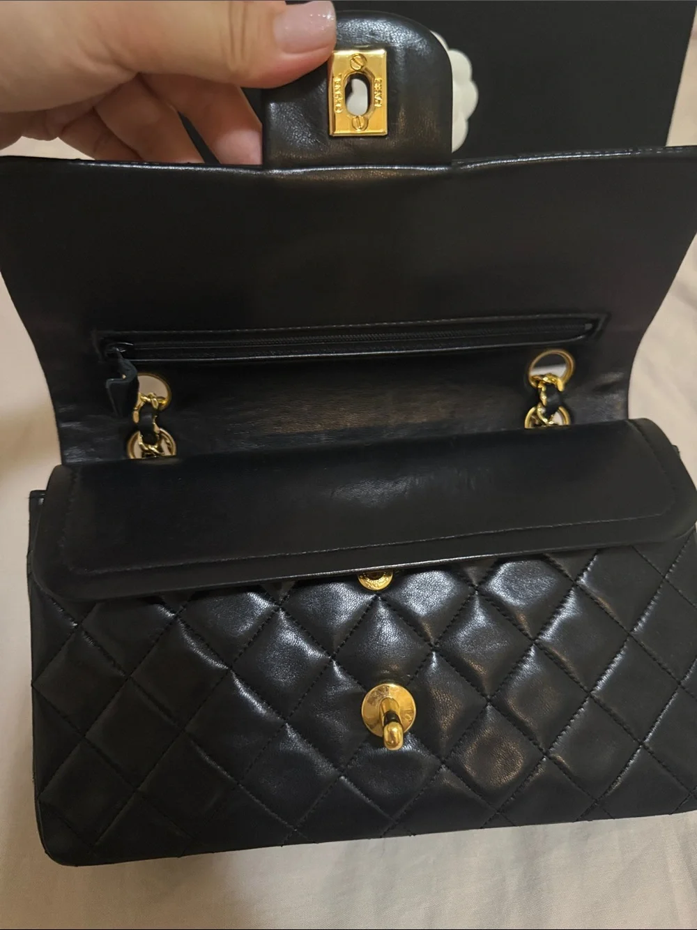 CHANEL Black Quilted Leather Shoulder Bag with Gold Chain